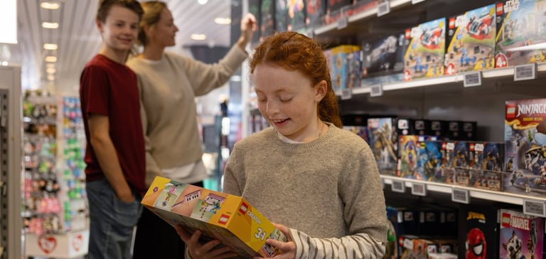 Young girl in the taxfree shop